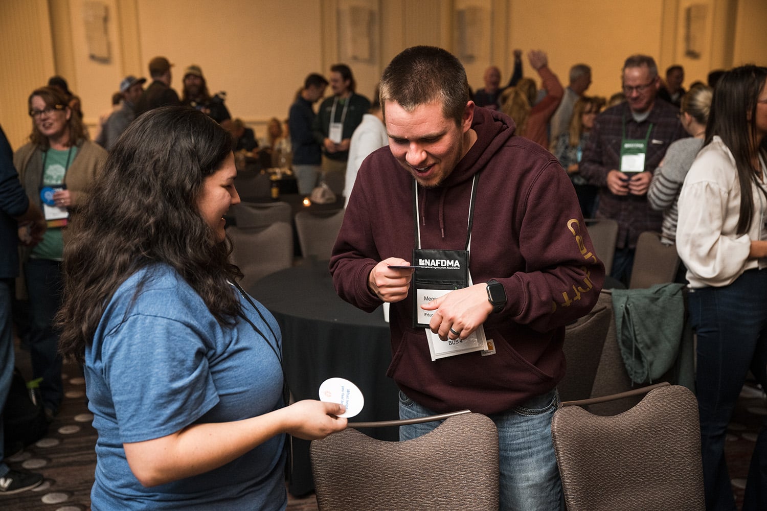 People interacting with cards conference